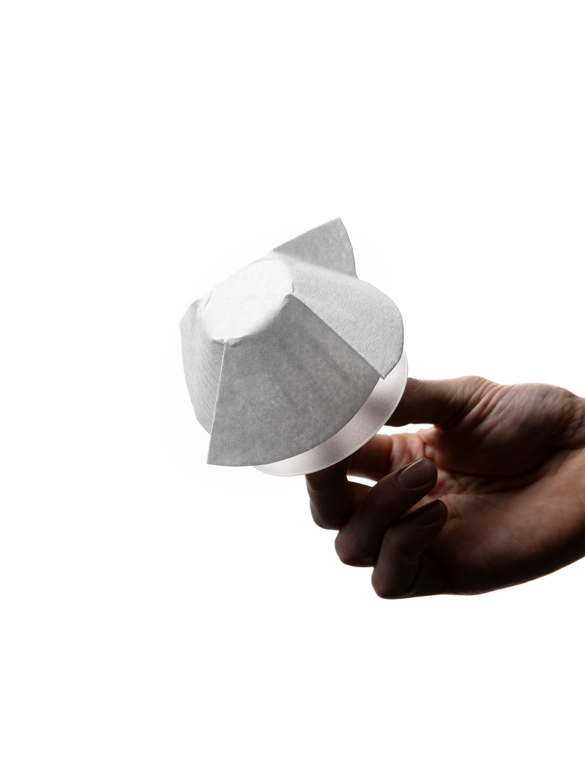 Flat paper filter shaped by the Orea Neo Negotiator